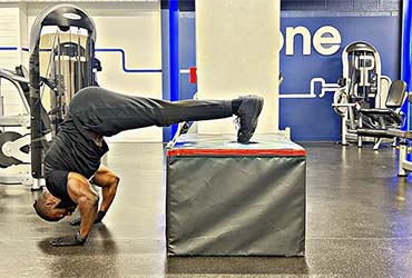 PT Demonstrating Elevated Pike Push-Ups